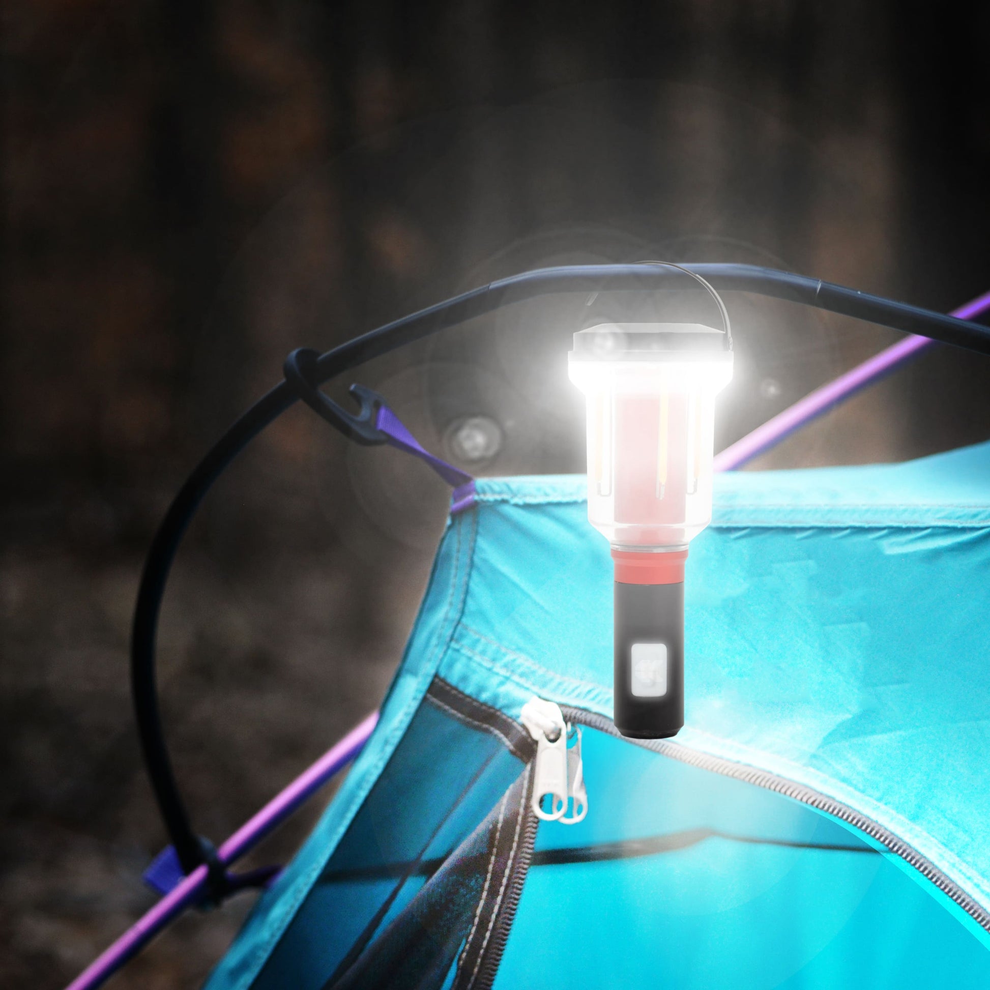 FLi-MORPHE lantern head attached to a blue tent with a dark background